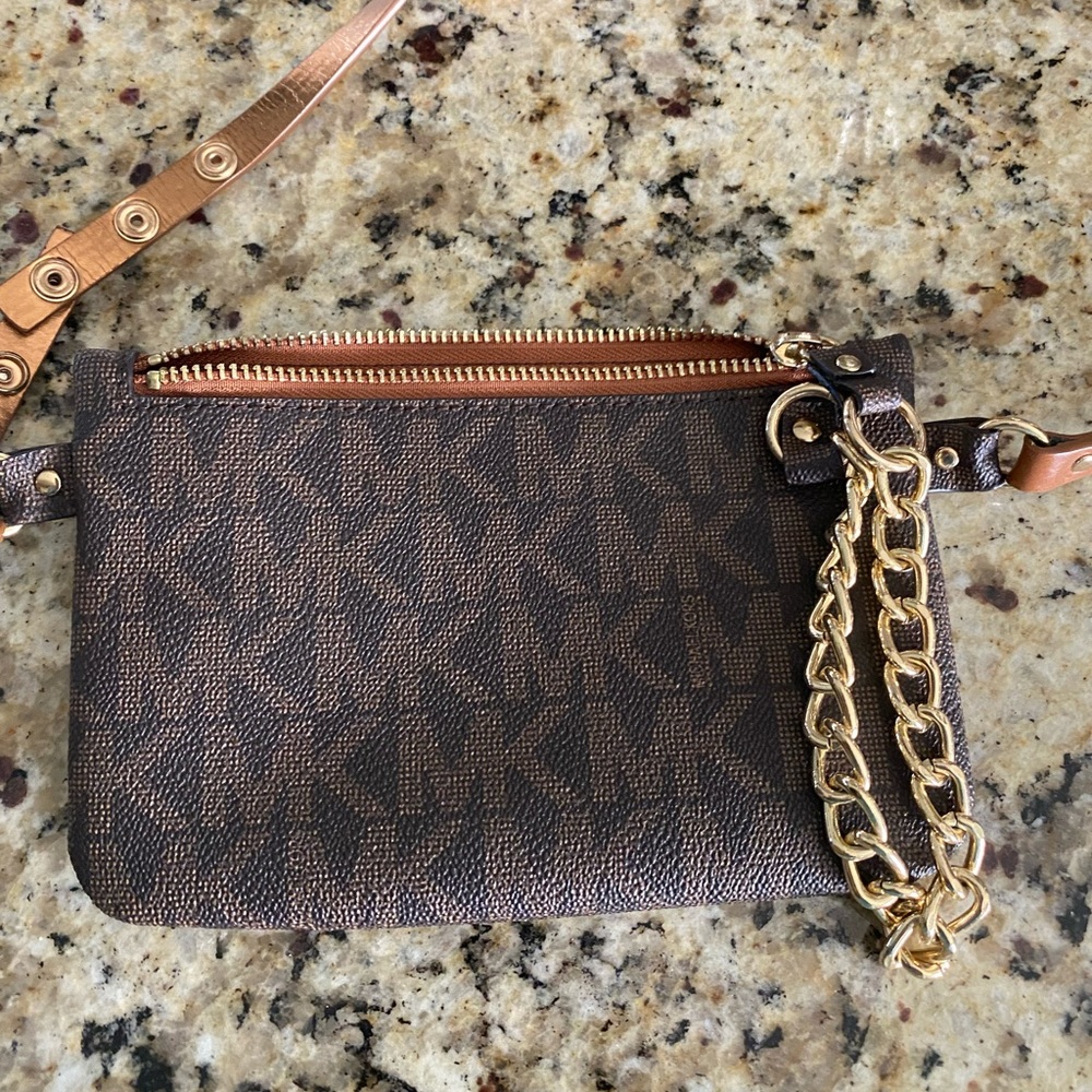 Micheal Kors brown signature adjustable waist belt/bag.